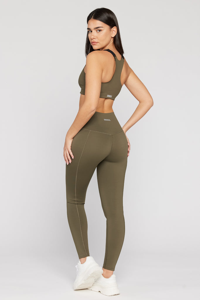 Aura -  טופ ספורטיבי עם רוכסן קדמי בצבע שחור | XS