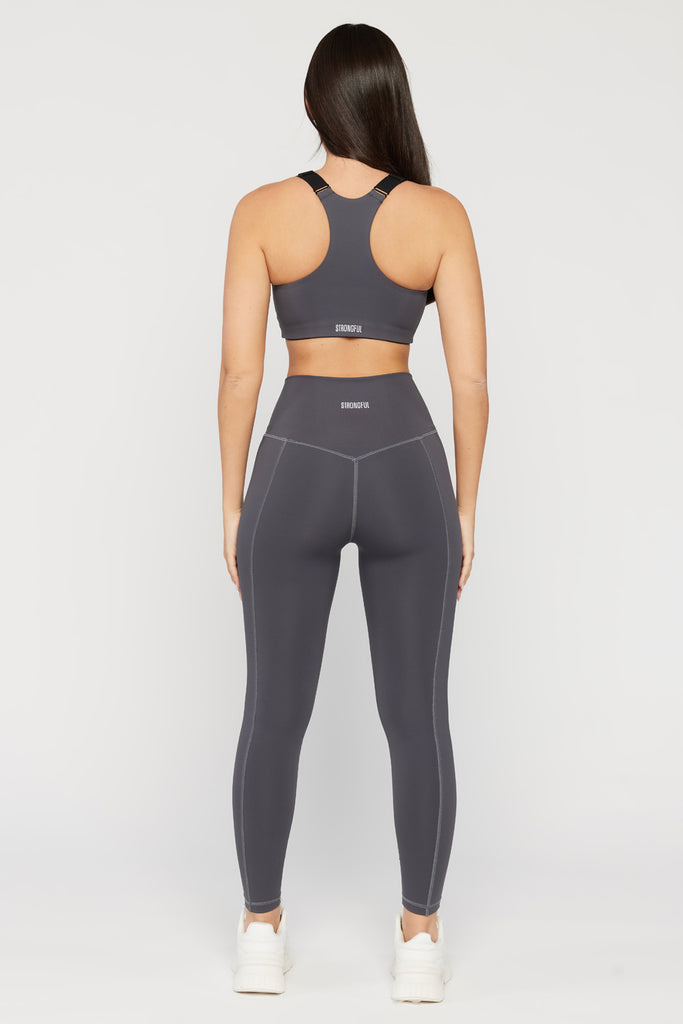 Aura - טופ ספורטיבי עם רוכסן קדמי בצבע שחור | XS