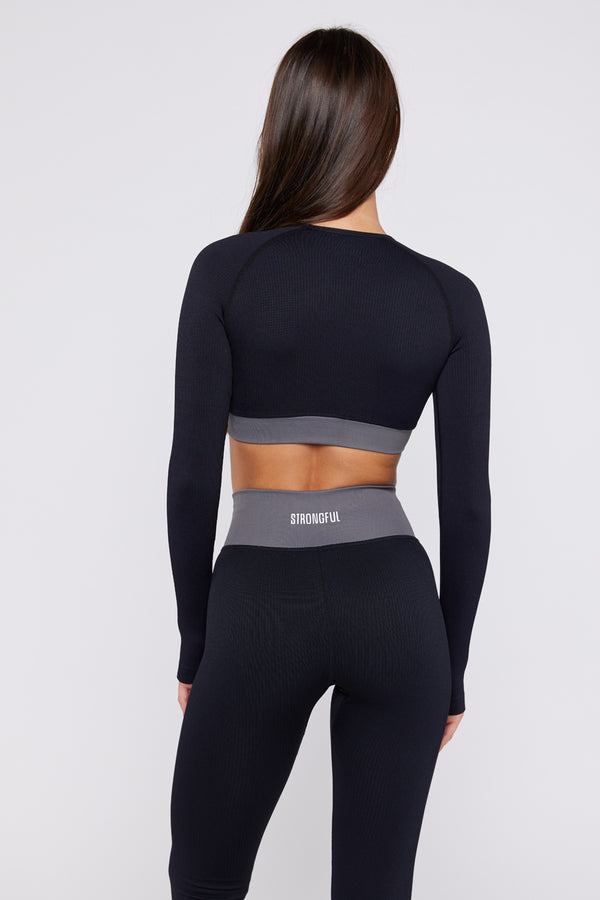 Bliss - חולצת קרופ טופ ספורטיבי בצבע שחור | XS